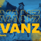 UCD grad student in gown and cap, leaping in with arms in the air in a vineyard with the words "Avanzar en UC Davis"